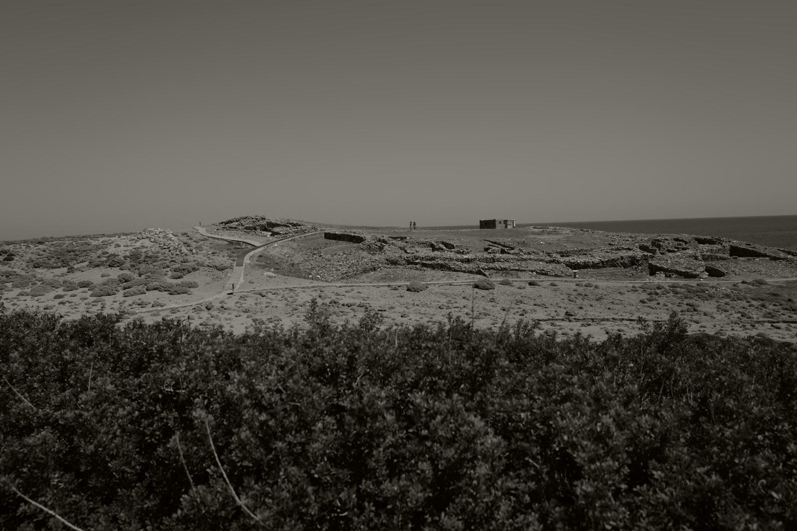 A path crossing the archaeological site of Palamari beside the sea